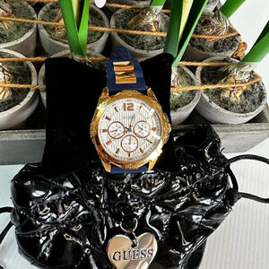 Guess Rubber Band with rose gold watch in excellent working condition